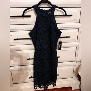 Brand new w/ tags Lulus lacy blue dress. Never been warn cocktail dress